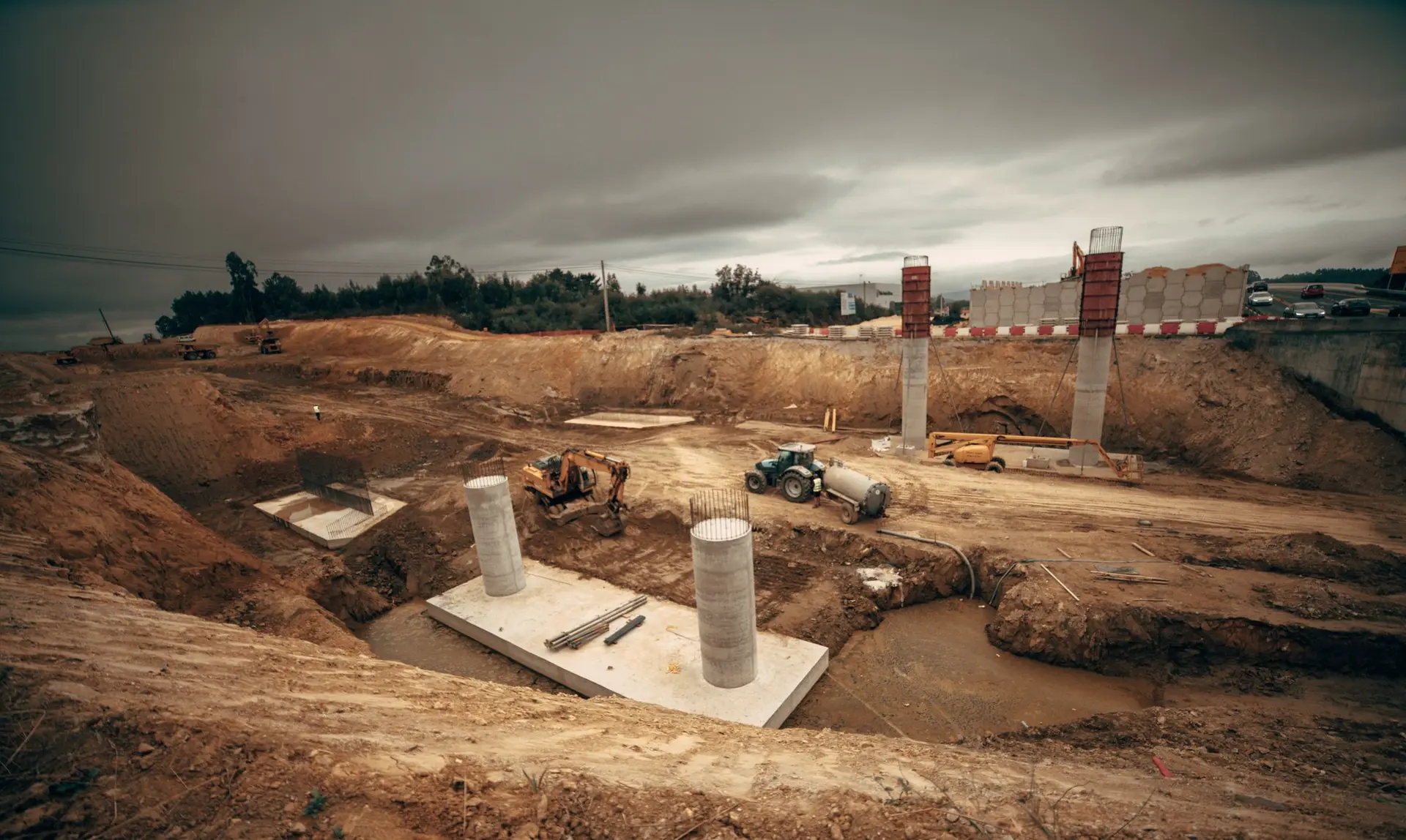 Concrete foundation piers set in an excavated building site